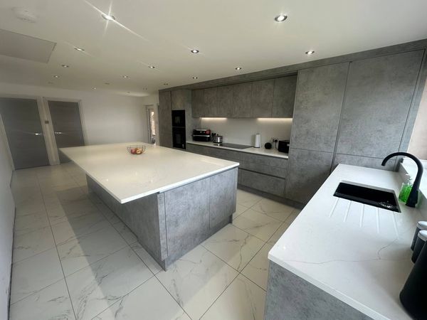 Kitchen with a large island and ceiling downlights