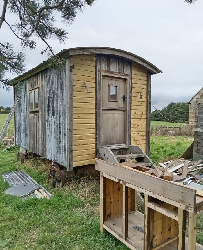 Shepherd's hut in a field
